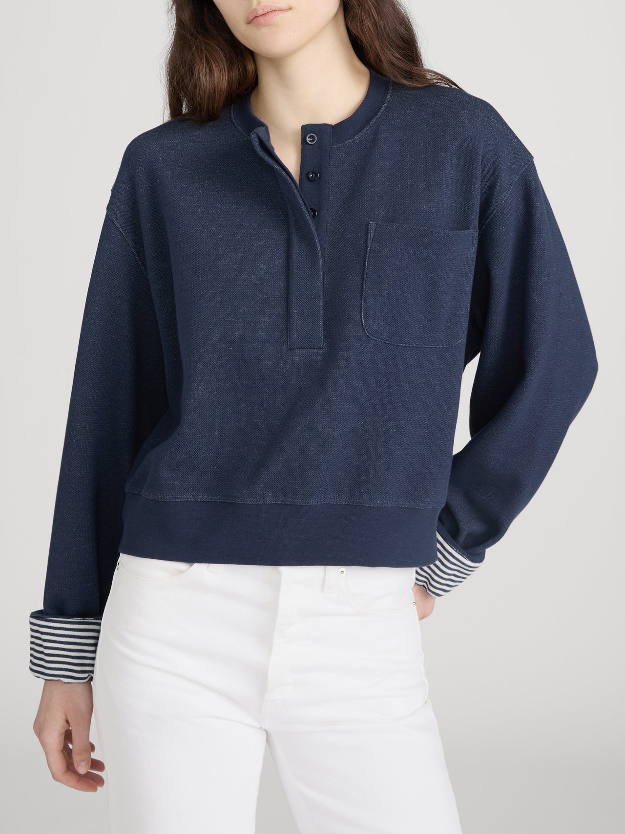navy crop sweatshirt with stripe detail on inside 