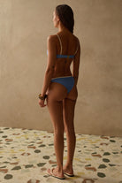 blue bikini bottoms with white around the top