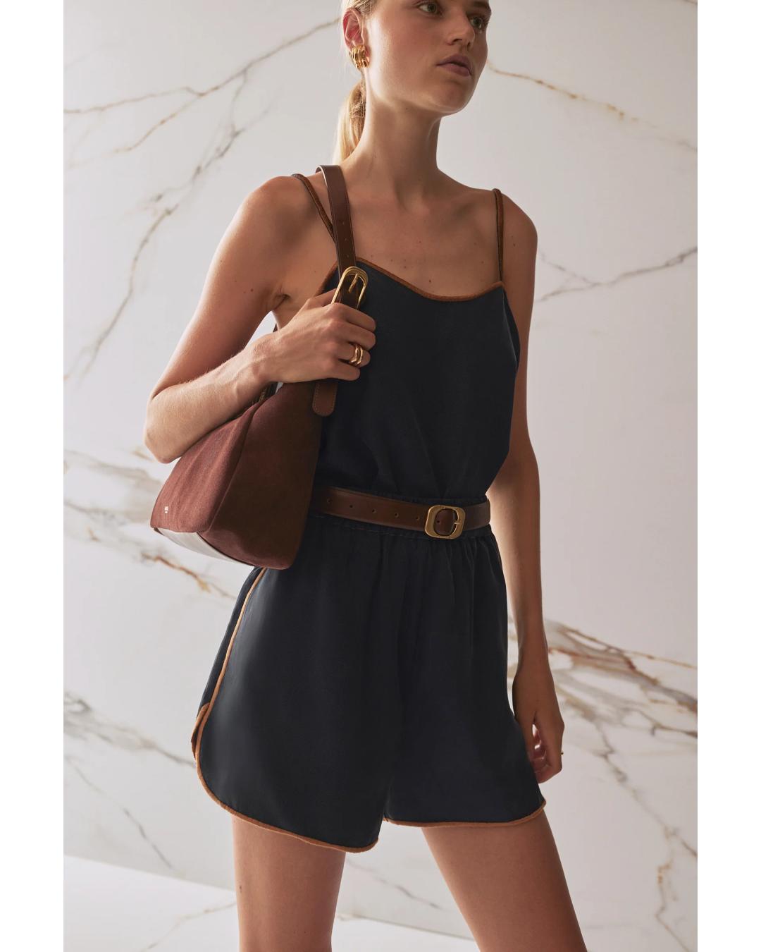brown leather belt with round gold buckle
