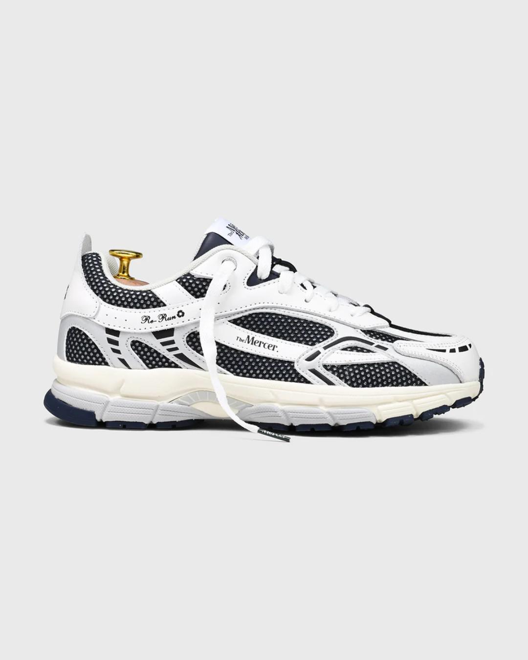 white and navy sneakers