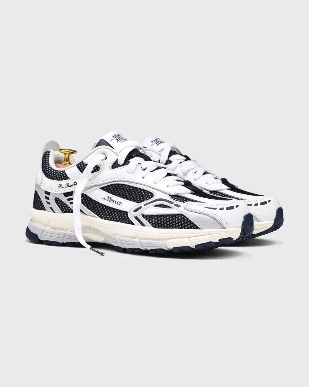 white and navy sneakers
