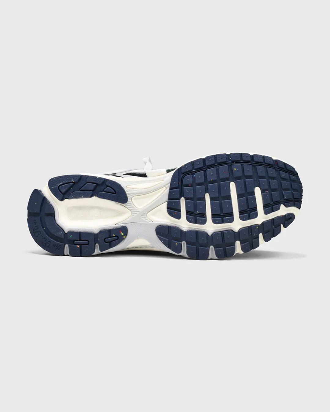 white and navy sneakers