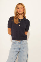 knit short sleeve sweater with collar and three buttons in navy