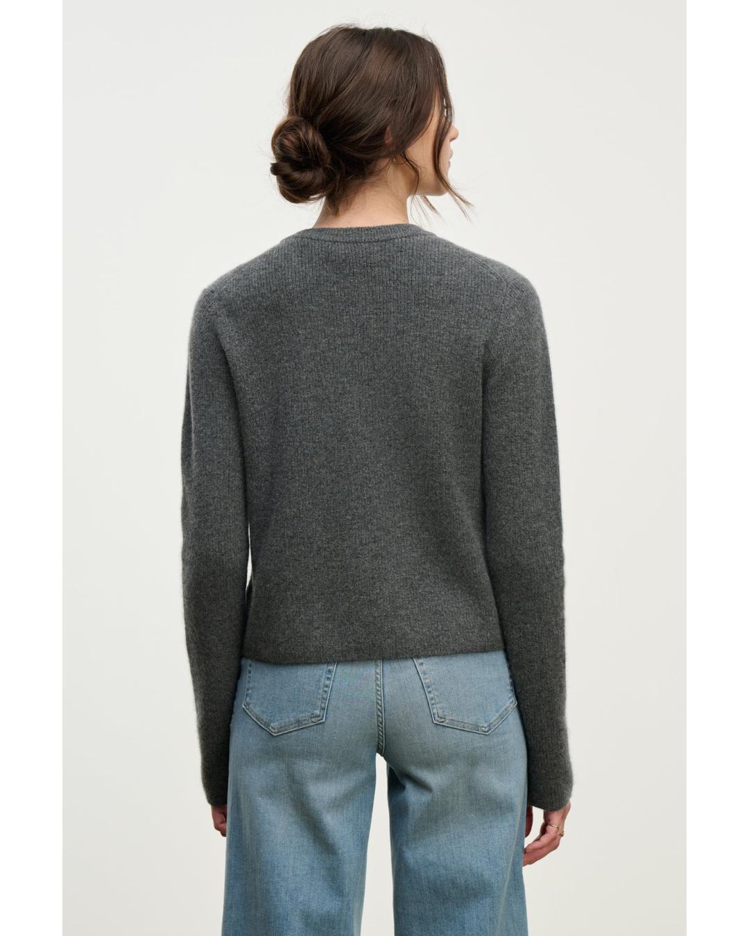 grey cashmere sweater with one button at the top