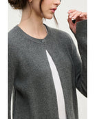 grey cashmere sweater with one button at the top