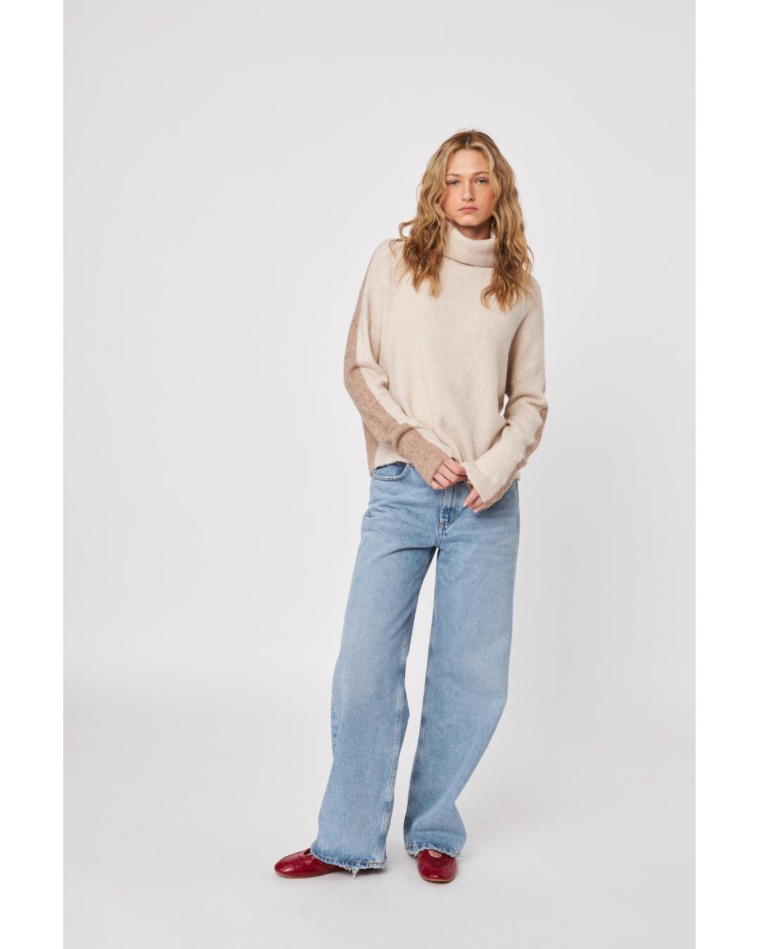 cream sweater with a turtleneck