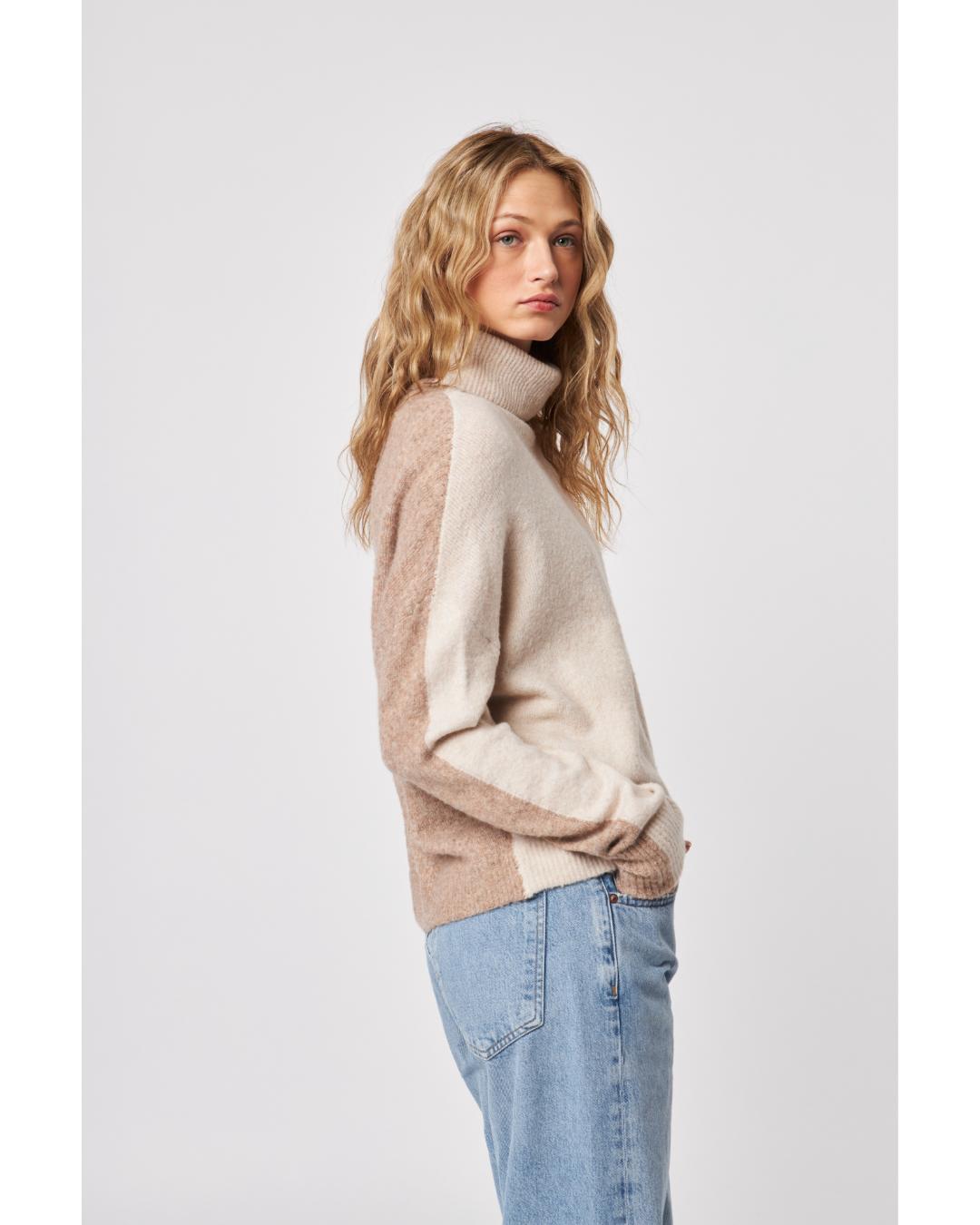 cream sweater with a turtleneck
