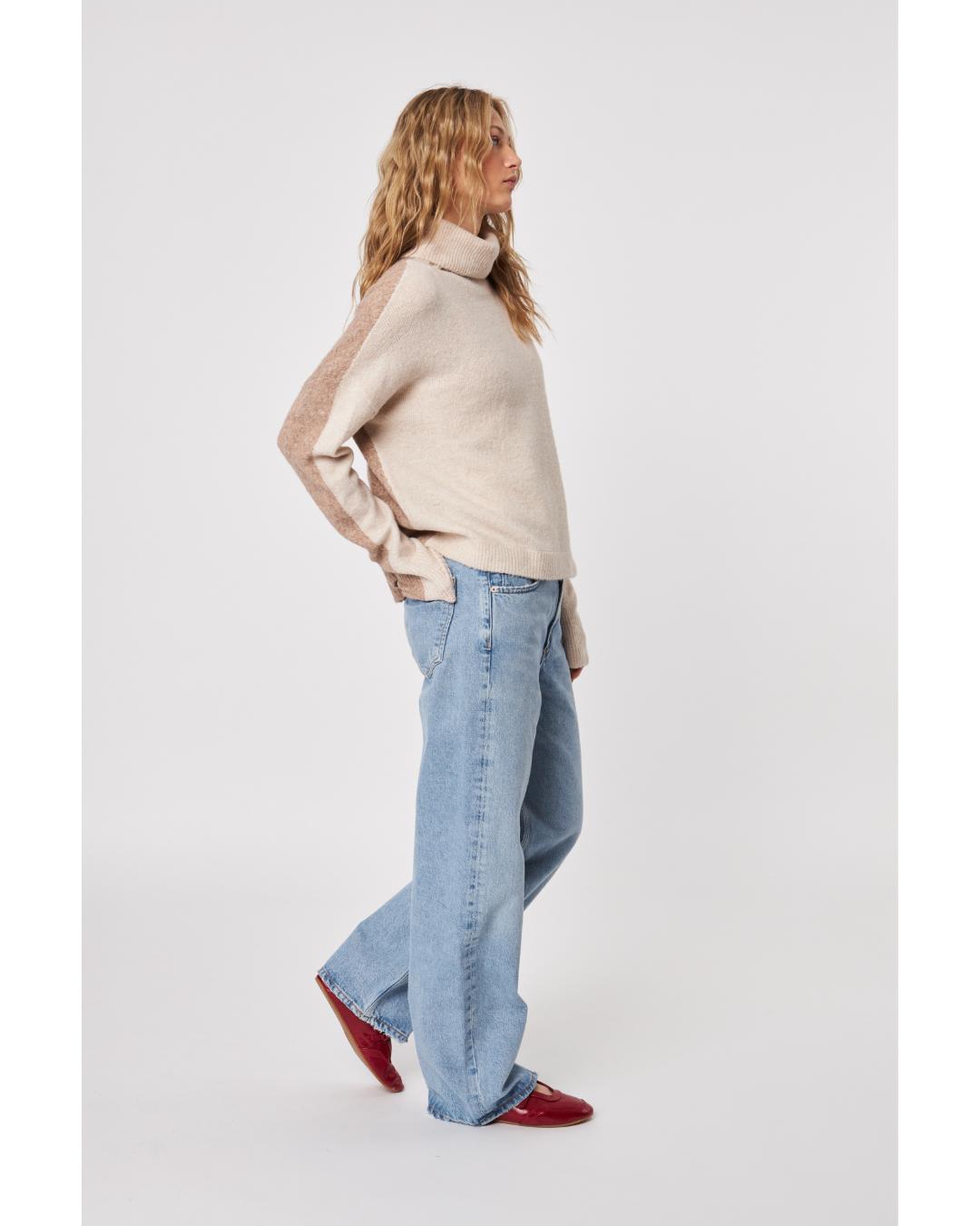 cream sweater with a turtleneck