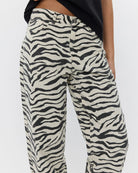 zebra printed jeans in a barrel style