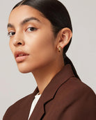 chunky small hoops in gold