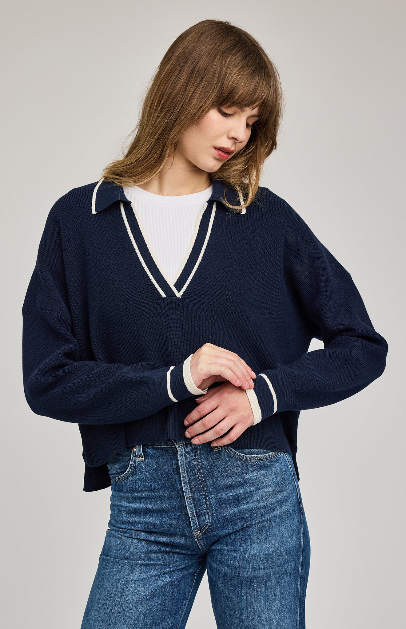 navy blue v-neck sweater with a collar