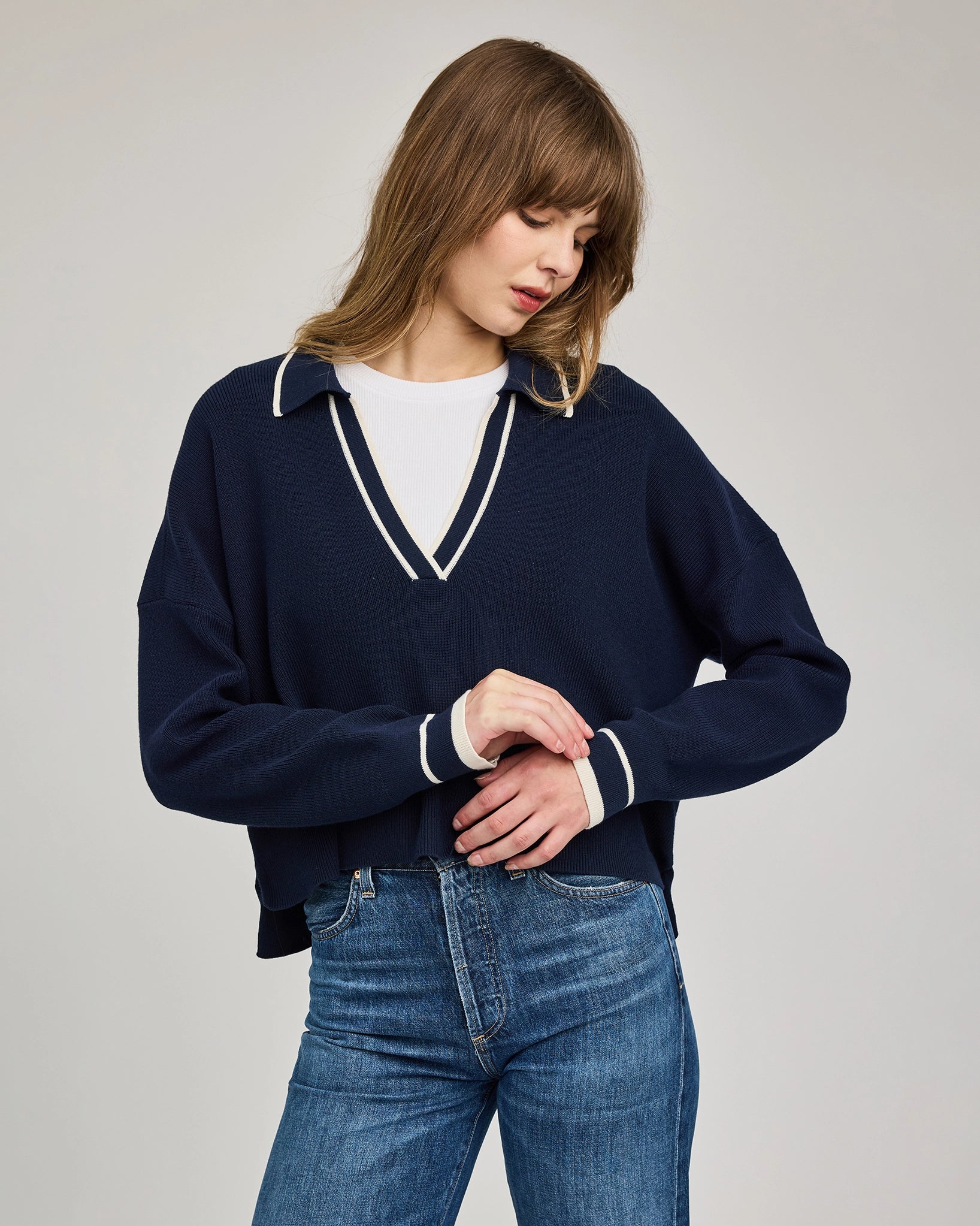 navy blue v-neck sweater with a collar