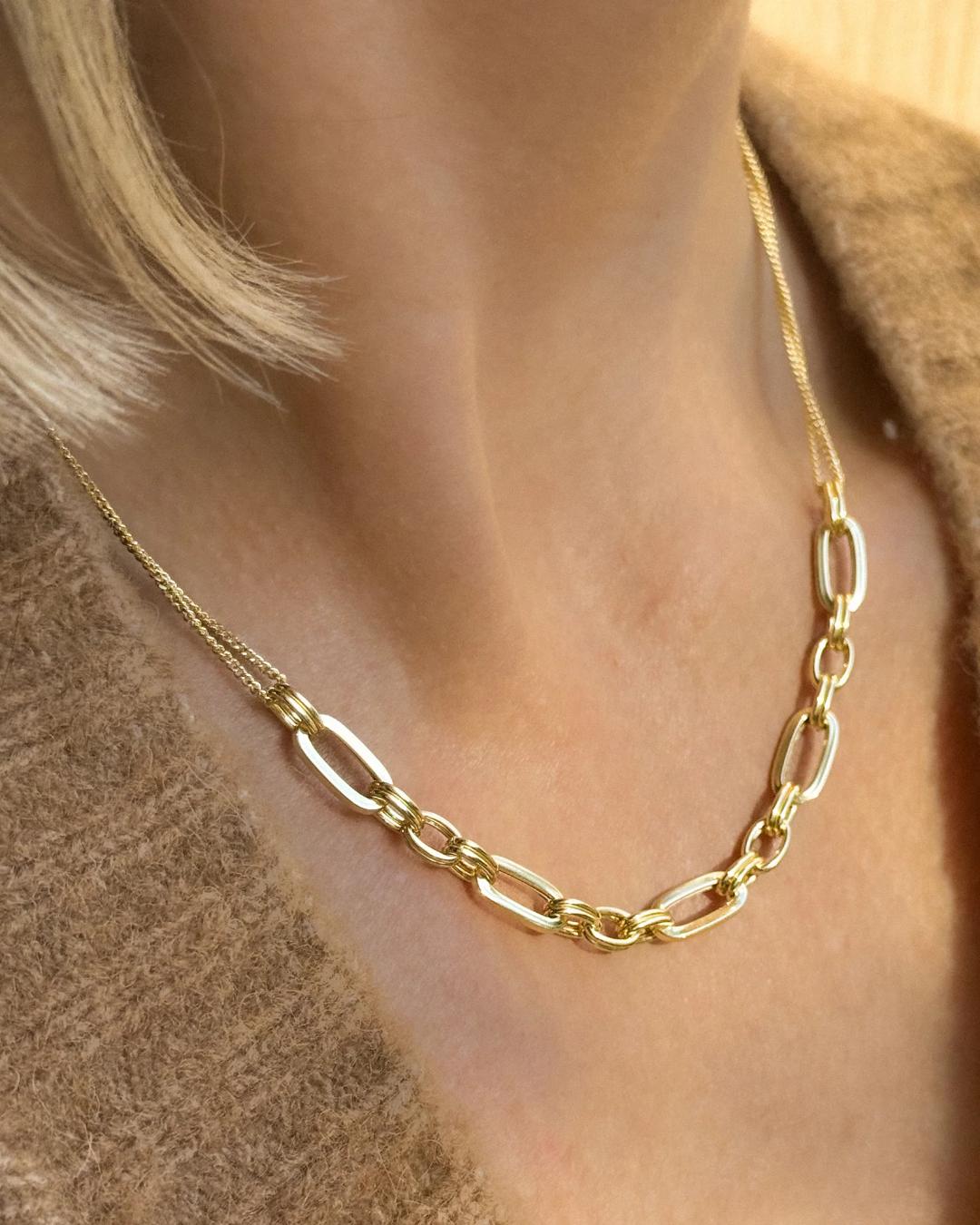 gold necklace with links in the middle