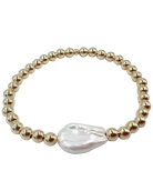 gold beaded bracelet with a large pearl in the middle