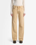 tan denim pants with a relaxed leg