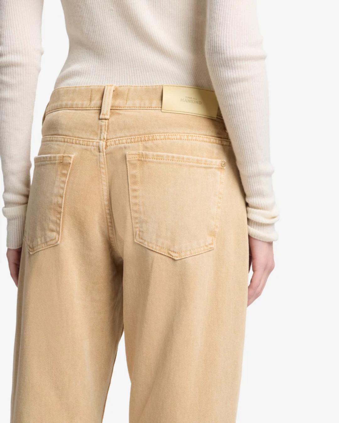 tan denim pants with a relaxed leg