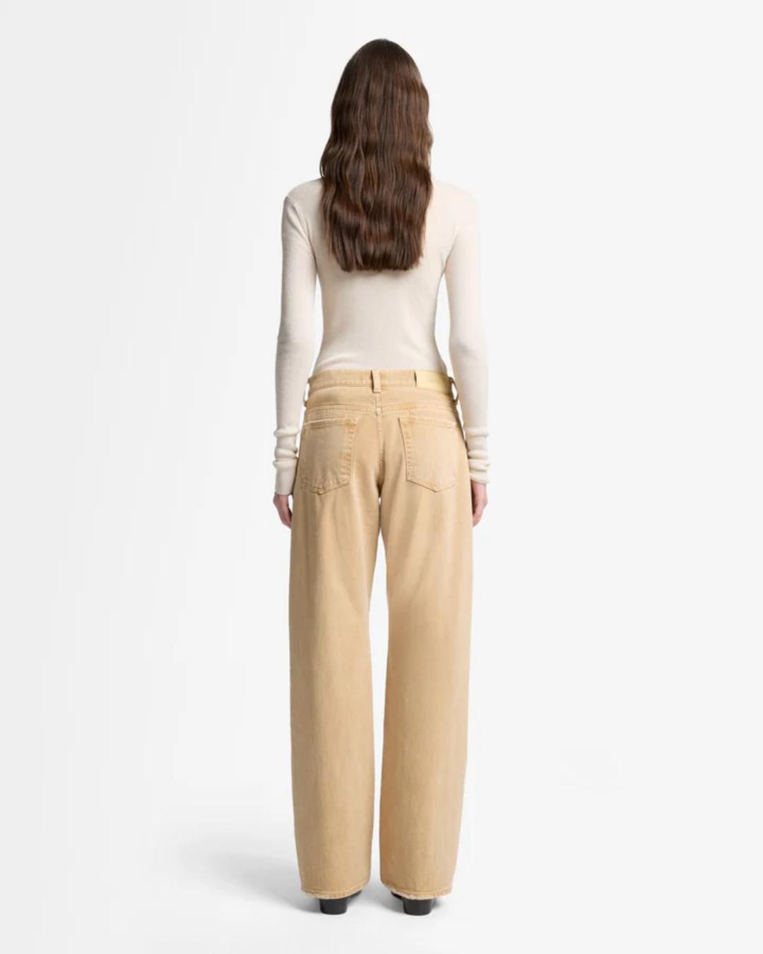 tan denim pants with a relaxed leg