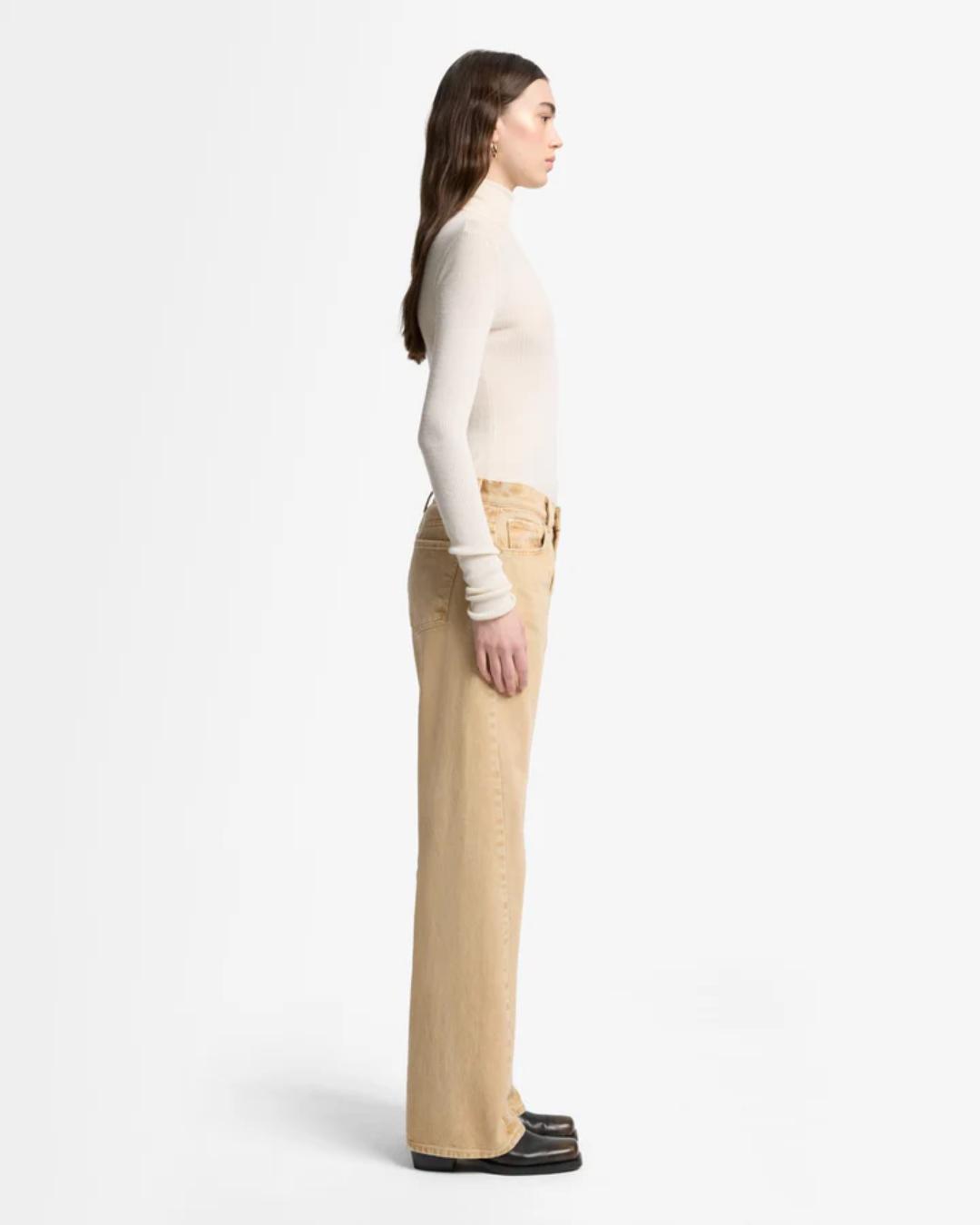 tan denim pants with a relaxed leg