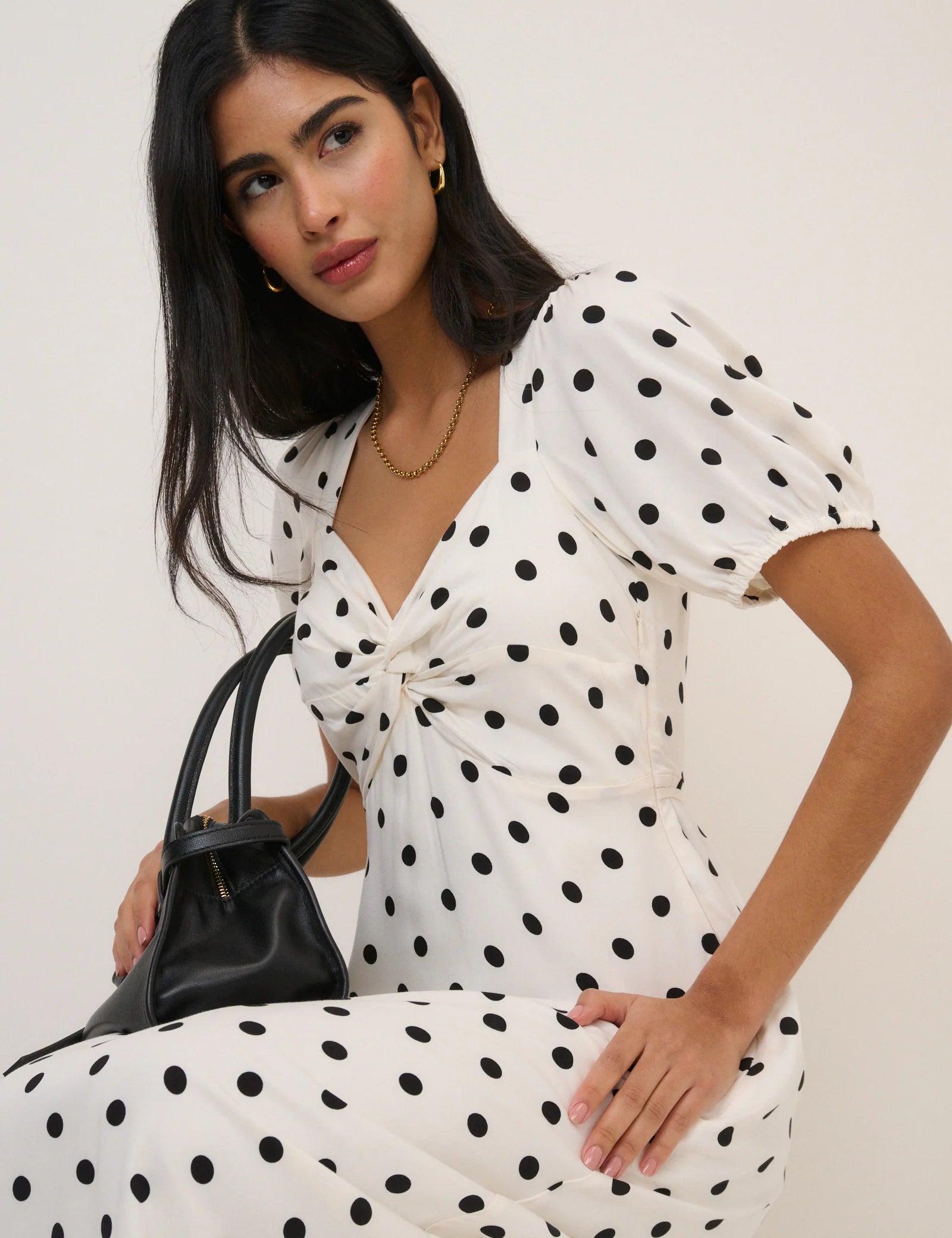 cream dress with polka dots