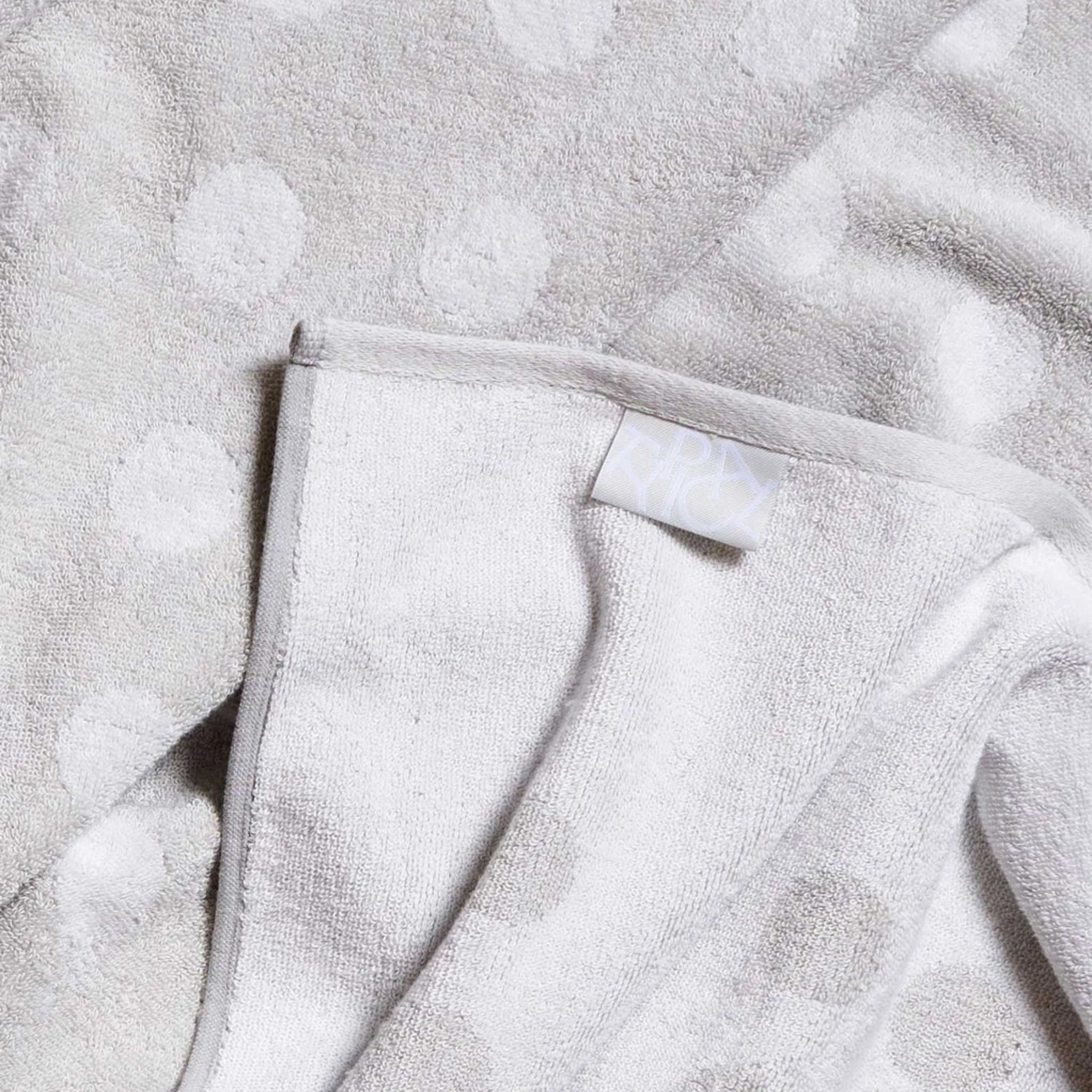 polka dot towel in grey