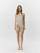 beige short with lace detail