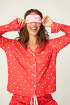 long sleeve, pant and eye mask pj set in red with pink hearts all over