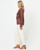 brown front tie long sleeve top with a collar