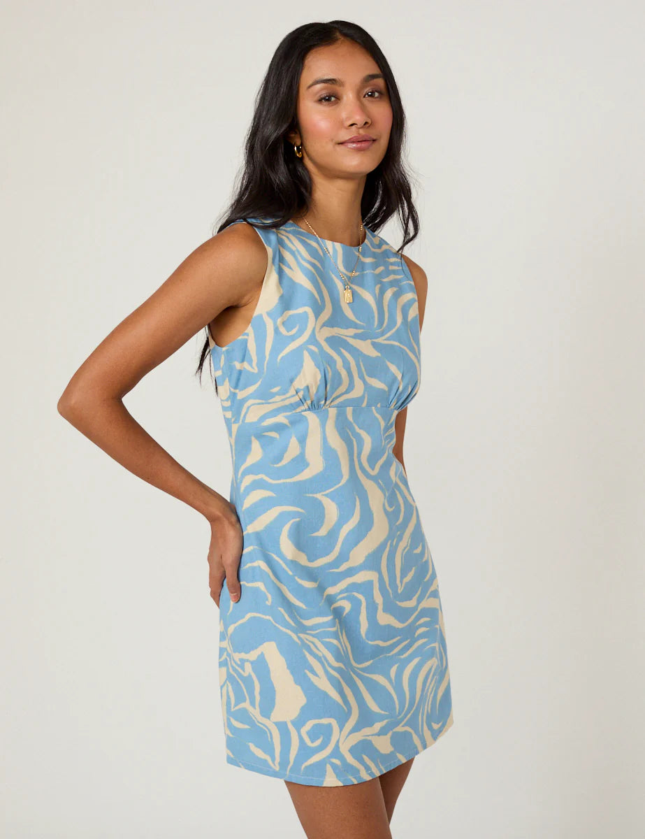 mini dress with high neck and blue and cream swirl pattern