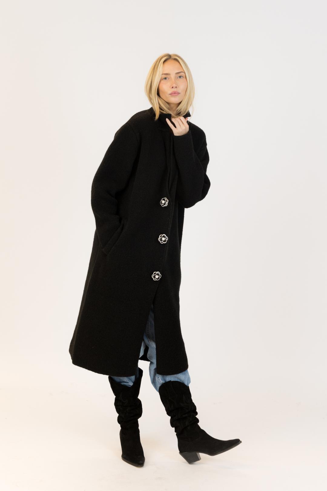 black coat with flower buttons