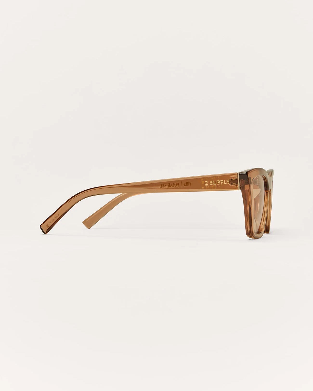 tan sunglasses with light brown lenses