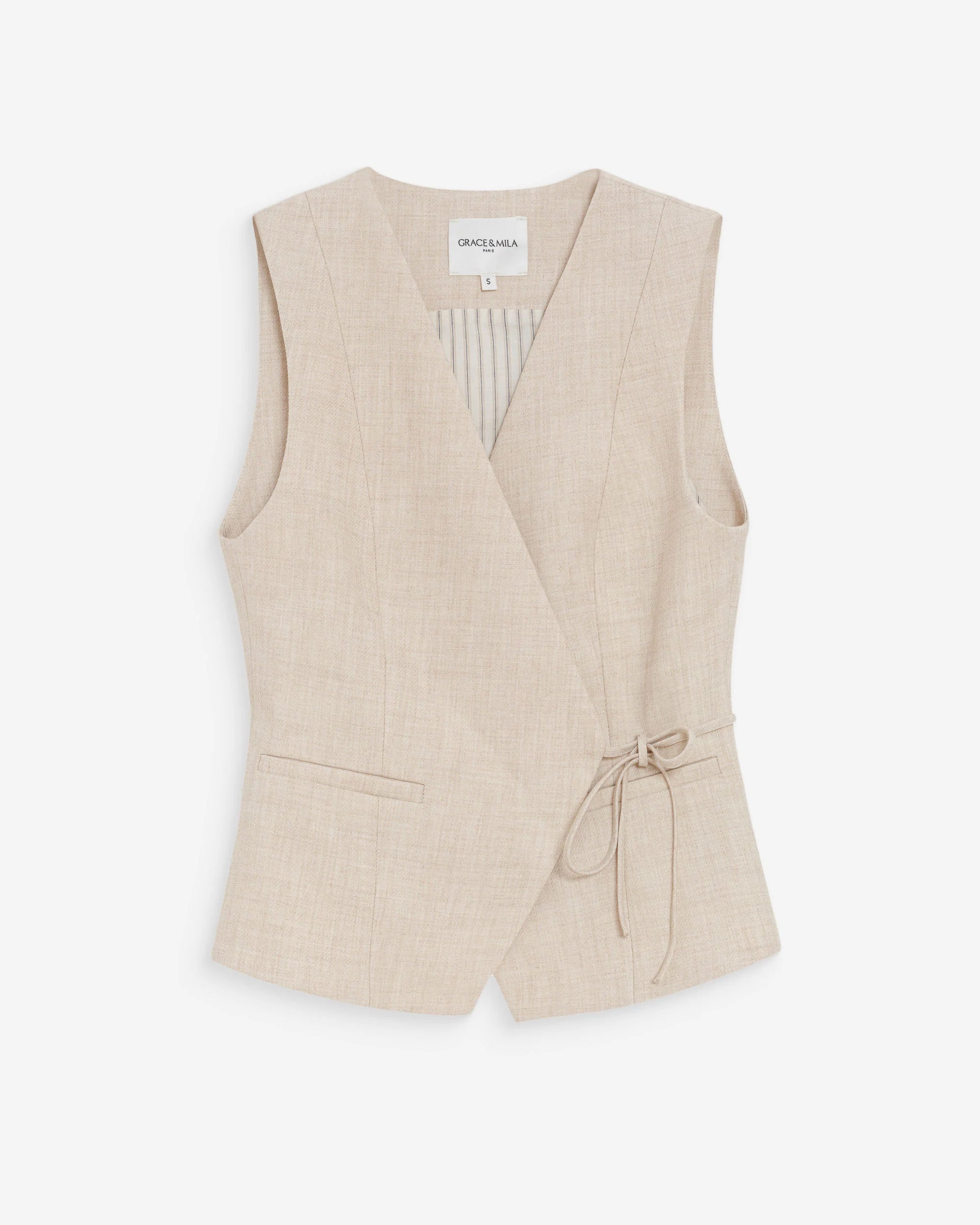 beige vest with a tie around the waist