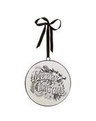 circular disc ornament in black and white that says merry christmas 