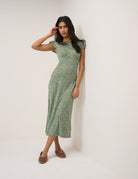 green midi dress with white polka dots 