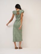 green midi dress with white polka dots 