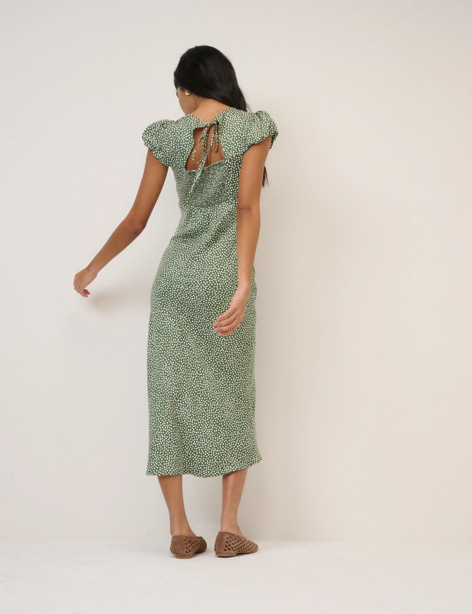 green midi dress with white polka dots 