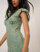 green midi dress with white polka dots 