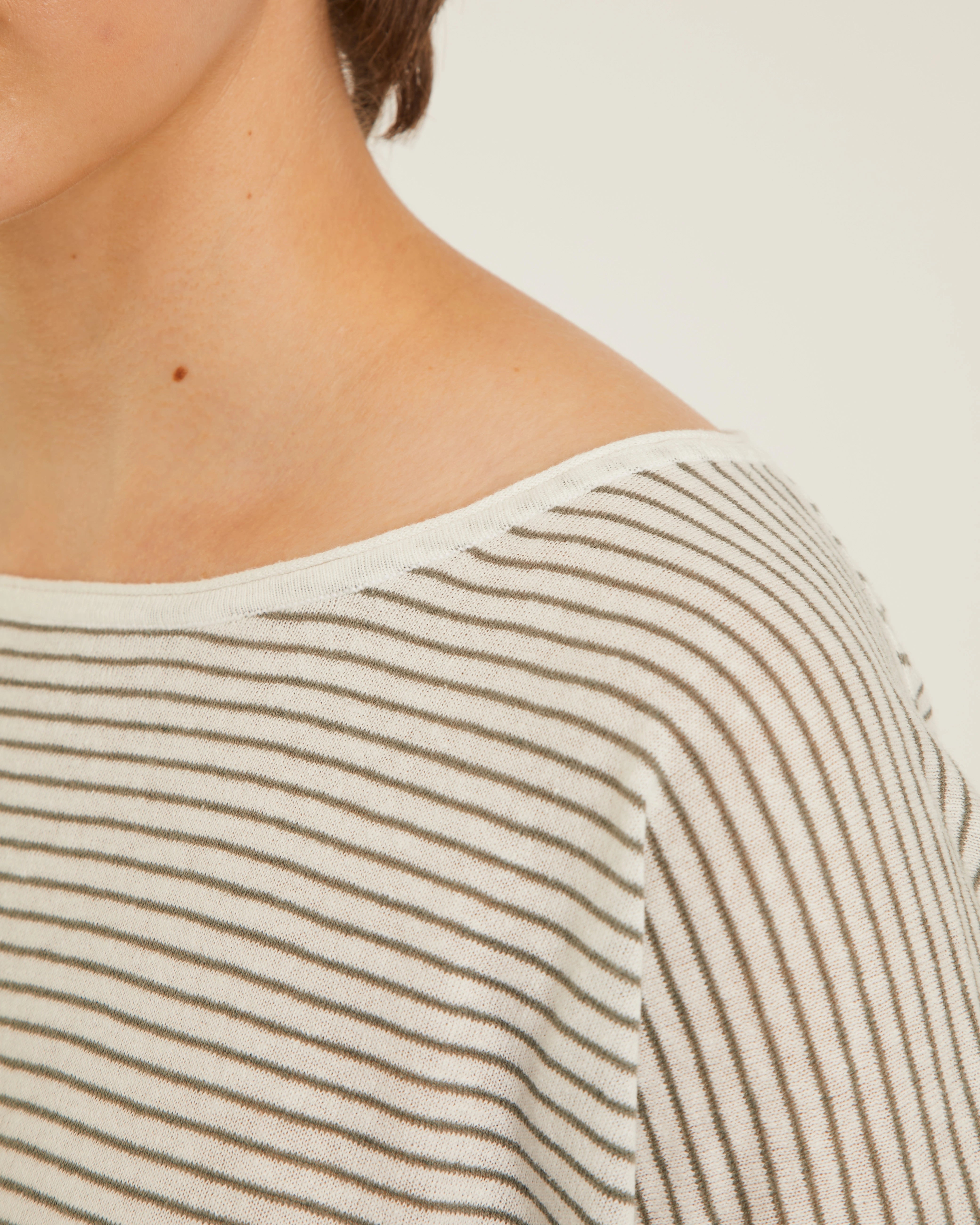 long sleeve sweater with white and green stripes 