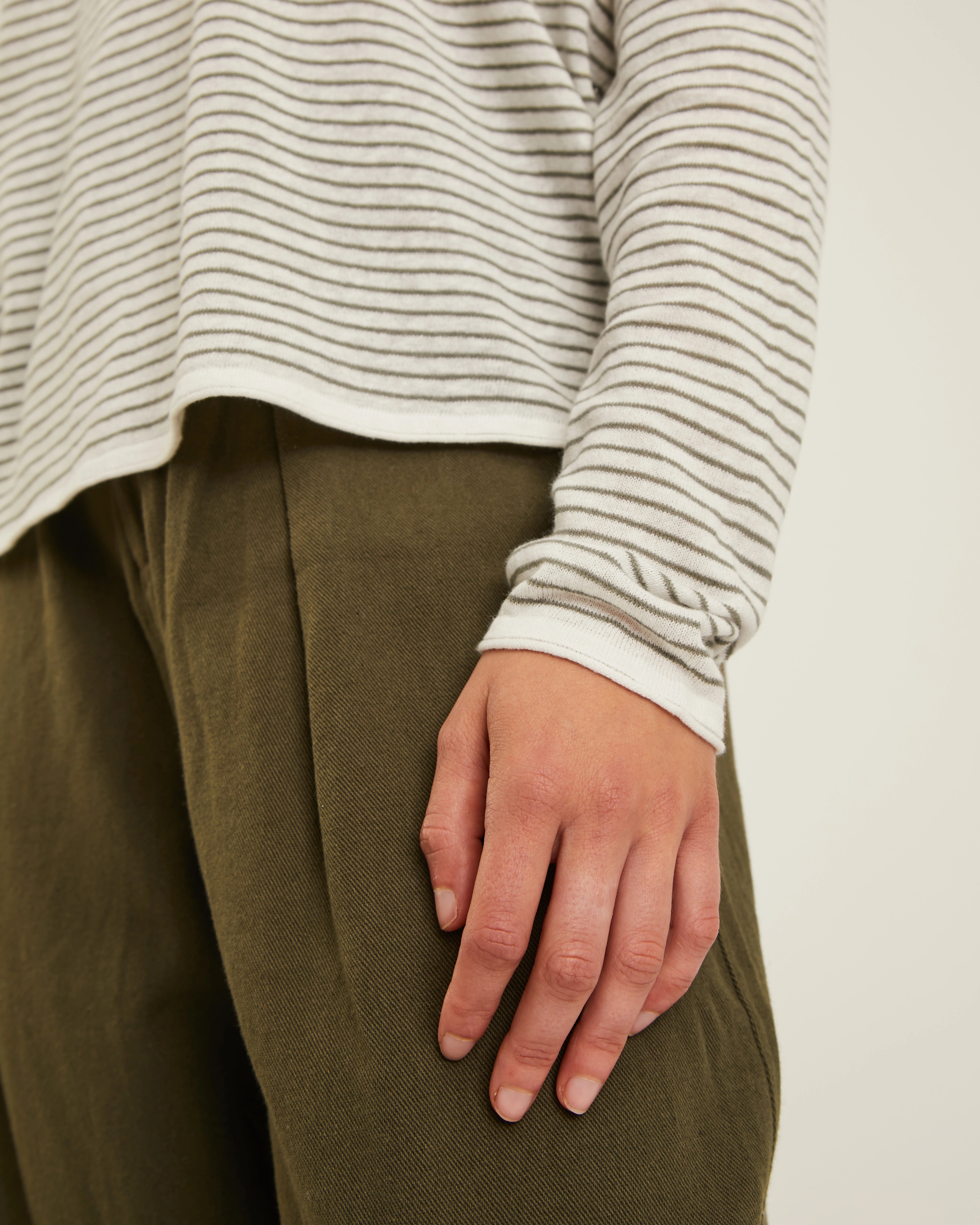 long sleeve sweater with white and green stripes 