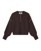 brown knit sweater with buttons half down and a green detail on sleeve