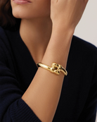 statement gold bangle with woven design