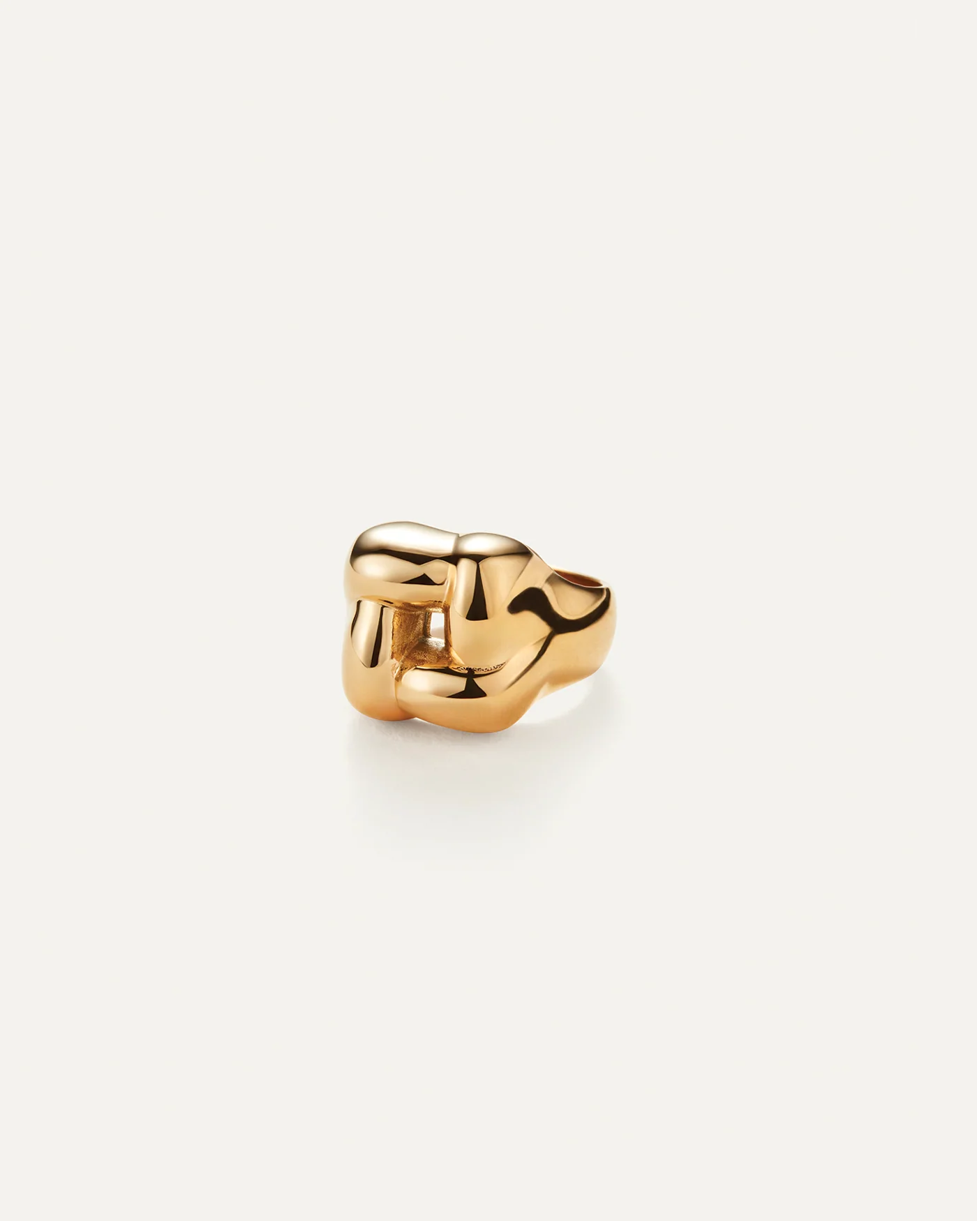 statement gold ring with a woven design on top