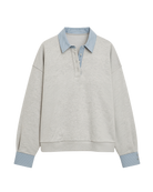grey pullover sweatshirt with half buttons down and a blue striped collar