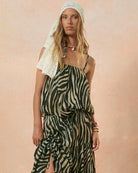 woman wearing a zebra print charcoal and cream camisole top