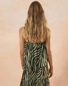 woman wearing a zebra print charcoal and cream camisole top