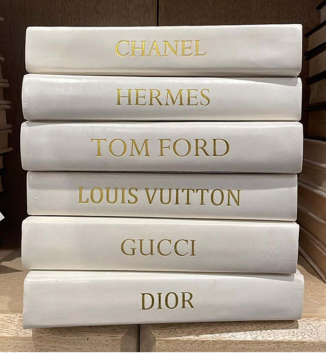 white and gold louis vuitton book